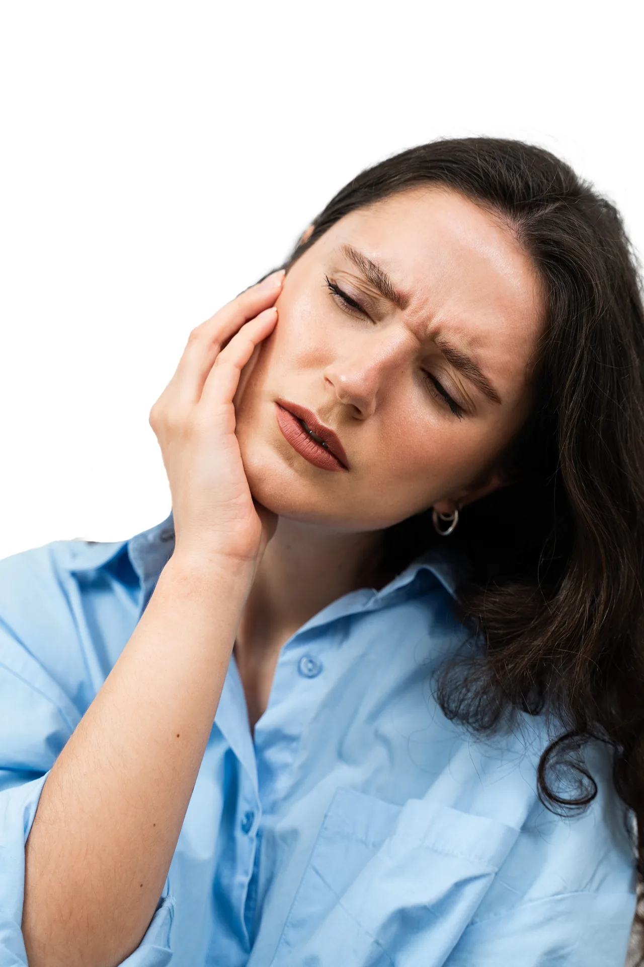 Mujer con dolor facial y de mandíbula provocado por el bruxismo